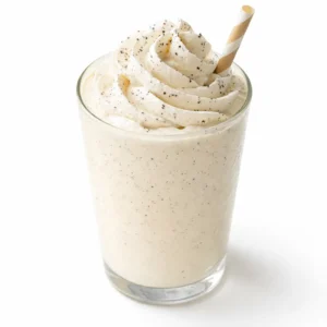 Whisking vanilla bean specks into creamy milk for a Starbucks vanilla bean copycat drink